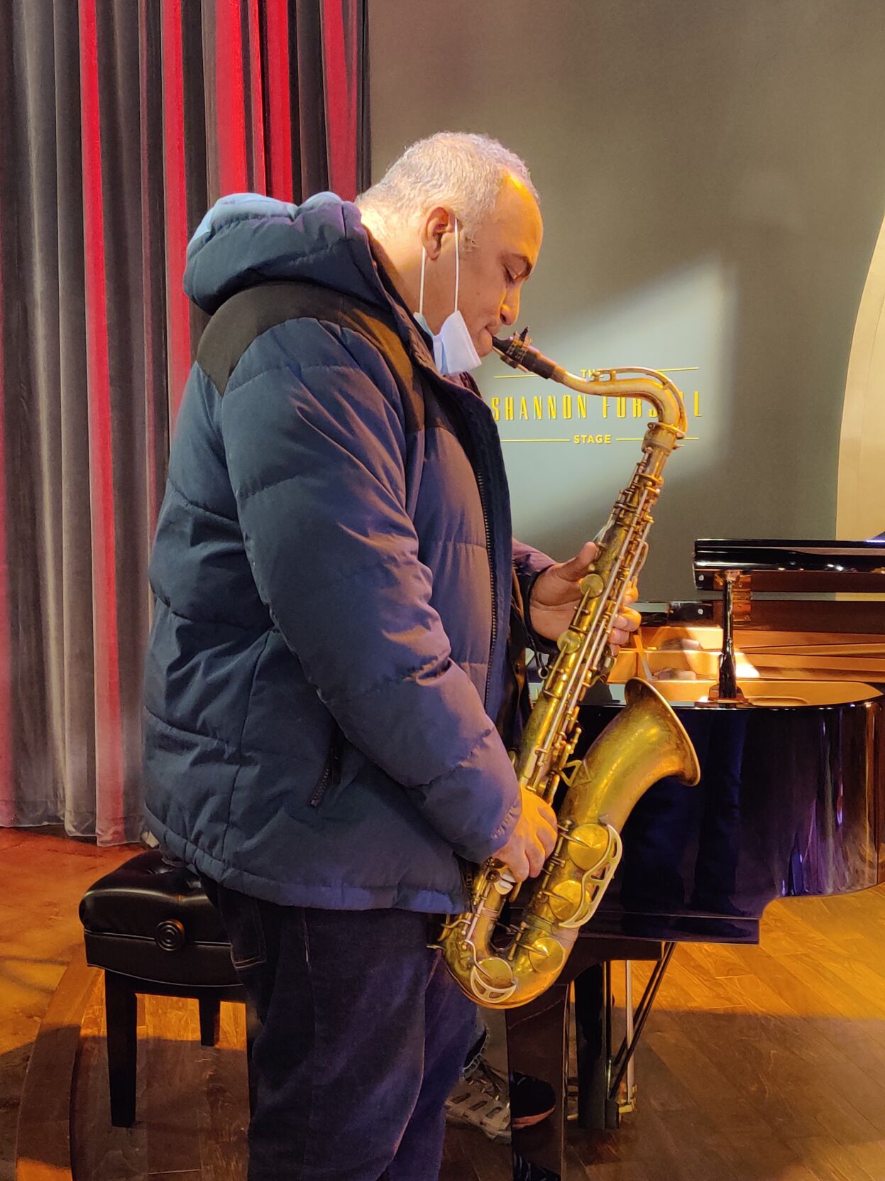 Rob Dixon on sax during rehearsal for "The Voodoo of Hell's Half-Acre"
